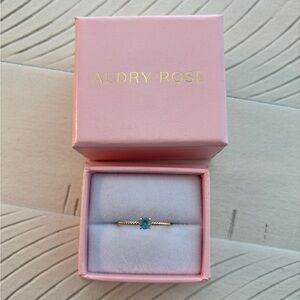 Audry Rose Peridot Ellie Ring with light blue stone